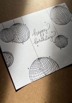 a piece of paper with the words happy birthday written on it