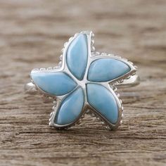 Wear the beauty of the sea with this starfish cocktail ring handcrafted by Thai artisan Michael Krainer. The five arms of this lovely starfish are larimar set in sterling silver rimmed in a bead motif. Turquoise Earrings Dangle, Jewelry Workshop, Jewelry Packaging, Cocktail Ring, Jewelry Gift Box, Cocktail Rings, Free Jewelry, Starfish, Turquoise Ring