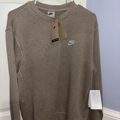 Nwt Nike Crewneck Sweatshirt In Men’s Size S. Color Is Like A Brownish/Tan With Specks Of Color. Let Me Know If You Want More Pictures. Can Also Fit A Women’s M. Nike Crewneck Sweatshirt, Nike Crew Neck, Nike Crewneck, Nike Sweaters, Nike Sweater, Nike Sweatshirts, Nike Tech, Tech Fleece, Nike Hoodie