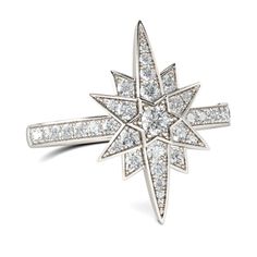 a white gold ring with diamonds in the shape of a snowflake, on a white background