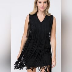 Black V Neck Suede Fringed Sleeveless Dress Fabric: 92% Poly 8% Span Also Available In Plus Fringe V-neck Dress For Night Out, Cocktail V-neck Mini Dress With Fringe, Black Sleeveless V-neck Dress For Cocktail, Black Sleeveless V-neck Cocktail Dress, Cocktail Dress With Fringe And V-neck, Elegant V-neck Dress With Fringe For Cocktail, Black Sleeveless V-neck Dress, Black Sleeveless V-neck Dress For Date Night, Black V-neck Sleeveless Dress For Date Night