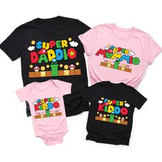 Shop Super Family Game Matching Tees with affordable from Beepumpkin™. Up to 30% off baby & kids personalized clothing make your life easy.Free Shipping $69+. Playful Father's Day T-shirt For Family, Playful Cotton Family T-shirt, Customizable Playful Cotton Tops, Family Cotton T-shirt With Cartoon Print, Family Cartoon Print Cotton T-shirt, Cotton T-shirt With Cartoon Print For Family, Casual Tops With Custom Print For Playtime, Family Matching Graphic Print Tops For Playtime, Cotton T-shirt With Custom Print For Playtime