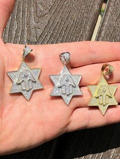 Gorgeous Star of David pendant with Hamsa!
SUPER ICY!
Solid 925 sterling silver
We have 3 styles! Rhodium finished, two-toned, & 14k yellow gold finished!
Measures roughly 1.25" by 1.25" (1.75" w. bale)...weighs roughly 10 grams
200 micropaved handset man made diamonds (CZ) for a total of 2ct!
SO ICY IT WILL BLIND YOU!
100% 925 silver...not plated or filled...will NEVER TARNISH OR CHANGE COLOR
You can buy pendant only or with choice of 18-30" 2.5mm diamond cut ball moon chains
Chain David Star, Star W, Hamsa Pendant, Star Of David Pendant, Man Made Diamonds, Diamond Star, Star Of David, Cz Stone, Chain Pendants