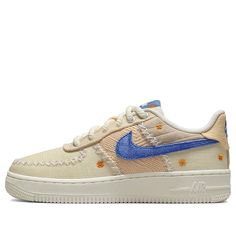 the nike air force 1 low in beige with blue and yellow flowers on the side