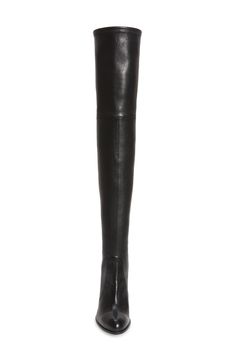 A revamped version of Stuart Weitzman's iconic Highland boot, the soaring Highstreet is fashioned in Spain from swanky stretch leather and detailed with tonal topstitching. A slim tie cinches the thigh-high cuff, while a pointed toe and angular block heel amp the drama. 3 1/2" heel 23 1/2" boot shaft; 12" - 14 1/2" calf circumference; stretches to fit calf Pull-on style with top tie closure Leather upper/leather and textile lining/rubber sole Made in Spain Salon Shoes Fitted Leather Knee-high Boots With Leather Lining, Luxury Faux Leather Boots For Fall, Designer Leather Knee-high Boots For Fall, Fitted Leather Knee-high Boots With Leather Sole, Designer Faux Leather Boots For Fall, Tall Sleek Leather Heeled Boots, Sleek Leather Heeled Boots For Fall, Sleek Leather Boots For Fall, Classic Fitted Leather Heeled Boots