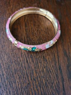 Pink floral enameled bangle bracelet.  Size medium.  Gold plated. Ruby Bracelet, Floral Bracelet, The Bangles, Cameo Necklace, Sapphire Bracelet, Real Stone, Genoa, Locket Necklace, Gold Style