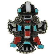 The ring is made up of Turquoise, Onyx, Mother of Pearl And Coral. Ring is a size 7.5- Measuring 1.47 in x 1.15 in. Hallmarked inside G.B Natachu. This is out of a massive collection of Hopi, Zuni, Navajo, Southwestern, sterling silver, costume jewelry and fine jewelry from one collector. Be sure to check our storefront for more fabulous pieces from this collection. We have been selling this collection on 1st dibs since 2013. You can Follow us via storefront as well. Thank you, Any questions ple Zuni Jewelry Yourgreatfinds ♥ Vintage Jewelry, Silver Costume, Bisbee Turquoise, Antique Turquoise, Zuni Jewelry, Native American Rings, Navajo Rings, Native American Turquoise, Coral Ring