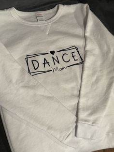 "Dance Mom". Personalized on a comfy and cozy ladies crewneck. Crew Neck Casual Top For Dance Class, Cotton Crew Neck Sweatshirt For Dance Class, Casual Graphic Print Sweatshirt For Dance Class, Casual Tops For Dance Class In Fall, Casual Fall Tops For Dance Class, Fall Crew Neck Sweatshirt For Dance Class, Casual Crew Neck Sweatshirt For Dance Class, Casual Long Sleeve Tops For Dance Class, Casual Relaxed Fit Sweatshirt For Dance Class