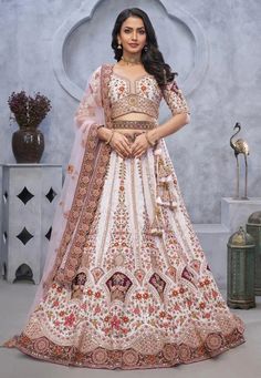 White organza wedding lehenga choli KF12P Desc: Style : Circular Lehenga Choli Color : White Fabric : Organza Silk Work : Sequence Embroidery Wash Care : Dry clean Sleeve Style : Half Sleeve Long Sleeves : Done only in Custom Stitch Sleeves Lining : Done only in Custom Stitch Bust Size : 32 to 42 Inches Occasion : Wedding Engagement Bridesmaid Reception Marriage Anniversary Party Wear. With Express Free Shipping Buy Designer Lehengas - Indian Party wedding and bridal White or...