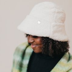 Meet our new Sage Sherpa Bucket Hat! This accessory is perfect for the fall/winter months, keeping you warm and stylish all season long. The Sage hat includes a thicker band around the head to add extra detail to the hat, and it's adjustable! Available in 2 colors including mocha and cream. Material: 100% Polyester Winter Wide Brim Bucket Hat One Size, Winter Wide Brim Bucket Hat, Winter Bucket Hat With Short Brim, One Size, Cozy Fleece-lined Hats For Cold Weather, Cozy Hats With Fleece Lining For Cold Weather, Adjustable Beige Bucket Hat For Fall, Cozy Hat With Fleece Lining For Cold Weather, Cozy Hats With Fleece Lining For Fall, Winter Bucket Hat With Faux Fur Lining