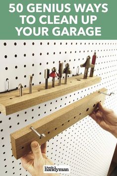 a man is holding up some pegs on a wall with the words 50 genius ways to clean up your garage