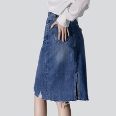 Introducing the 2023 Spring-Summer Collection's Grunge-style Distressed Hem Mid-calf Jean Skirt a fashion-forward statement for the new millennium!Why You'll Love ItThis mid-calf jean skirt is designed with an eye for detail. combining the rock-n-roll mode of vintage couture with a modern silhouette. Its tall-rise design and distressed hemline create a flattering shape. while its zipper and button closure provide a secure fit.Distinctive Features Grunge Style: Upgrade your wardrobe with this mid Summer Denim Knee-length Skirt, Non-stretch Mid-rise Denim Skirt For Spring, Non-stretch Denim Skirt With Frayed Hem, Spring Knee-length Denim Blue Skirt, Summer Stretch Skirt With Frayed Hem, Stretch Summer Skirt With Frayed Hem, Stretch Skirt With Frayed Hem For Summer, Chic Knee-length Denim Skirt For Summer, Fall Denim Knee-length Skirt