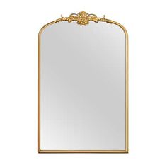 an ornate gold framed mirror on a white background