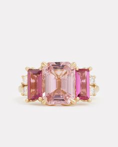 18K Yellow Gold Emerald Cut Ring with Pink Tourmaline and Diamonds, .2 TCWOrnament is 1/2 Inch x 3/4 Inch Style# YRECPTPTW Luxury Pink Morganite Jewelry, Luxury Pink Multi-stone Sapphire Ring, Pink Oval Multi-stone Ruby Ring, Luxury Pink Multi-stone Ruby Ring, Elegant Pink Multi-stone Sapphire Ring, Fine Jewelry Pink Multi-stone Jewelry, Luxury Pink Ruby Ring With Accent Stones, Pink Multi-stone Sapphire Ring In Fine Jewelry Style, Pink Multi-stone Sapphire Ring, Fine Jewelry