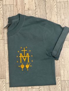 Catholic T Shirt, Green Crew Neck T-shirt With Custom Embroidery, Relaxed Fit Cotton T-shirt As Gift, Cotton Relaxed Fit T-shirt As Gift, Cotton Relaxed Fit T-shirt For Gift, Relaxed Fit Top With Embroidered Text For Gift, Crew Neck Cotton Shirt With Embroidered Text, Cotton Shirt With Custom Embroidery, Short Sleeve, Casual Embroidered Text T-shirt As Gift