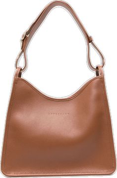 a brown leather handbag on a white background