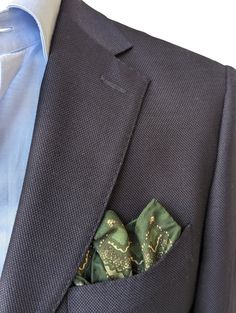 Here is a beautiful pocket square from Battisti Napoli. Made with wonderfully soft cotton silk blend, this classic square is a great addition to any tailored ensemble. DETAILS: Color: Light with dark green Composition: 70% Cotton 30% Silk Measurements: 12" square Made in: Italy Classic Cotton Pocket Square For Formal Wear, Classic Cotton Pocket Square For Formal Occasions, Classic Cotton Pocket Square For Formal Events, Classic Cotton Pocket Square For Business, Cotton Pocket Square For Business, Tailored Elegant Pocket Square For Formal Occasions, Elegant Tailored Pocket Square For Formal Occasions, Green Cotton Formal Suits, Elegant Tailored Pocket Square For Semi-formal Occasions