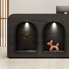 an office desk with three windows and a stuffed dog in the middle, on top of a white floor