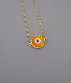 "Evil Eye Necklace - Orange Necklace - Gold Necklace - Good Luck Necklace - Chloe's Vintage Jewelry - handmade jewelry This is a very cool Evil Eye handmade glass pendant. A bright orange and blue glass evil eye in a gold plated bezel. It hangs on a gold plated chain. Chloe says, \"Wear it and feel fabulous!\" The pendant is 1\" long. You can choose the length of chain you would like at checkout. Thanks for visiting Chloe's" Spiritual Yellow Gold Necklace With Evil Eye, Symbolic Evil Eye Yellow Gold Necklace, Yellow Gold Evil Eye Charm Necklace, Spiritual Gold Eye-shaped Necklace, Luck Necklace, Gold-plated Evil Eye Amulet Necklace, Good Luck Necklace, Necklace Orange, Crown Necklace