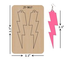 a pair of wooden earrings with an image of two lightnings on the front and back