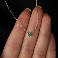 Green, Gorgeous, and Guaranteed to Bring Smiles! 💚  #emerald #giftsforher Heart-shaped Emerald Necklaces As A Gift, Yellow Gold Heart Necklace With Gemstone, Heart Shaped Emerald Necklace As A Gift, 14k Gold Heart Necklace With Gemstone, Heart-shaped Emerald Necklace As A Gift, Heart-shaped Emerald Necklace For Gift, Fine Jewelry 14k Gold Heart Necklace With Birthstone, 14k Gold Heart Cut Jewelry For May Birthstone, Gold Emerald Heart Pendant Jewelry