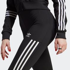 Style No. IC2383 Color: Black/White Tight fit. Elastic waist. 79% recycled polyester, 21% elastane interlock. adidas Women's Originals Leggings - Black. Flared Leggings, Women Essentials, Striped Leggings, Adidas Women, Black Leggings, Elastic Waist, Tights, Black White, Adidas