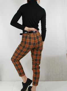 Fully lined check tartan patterned tapered Mom jean style chino/Capri pants in navy and chestnut brown colourway. Other colours available in our shop (see final photo). - Flattering high rise at the waist and narrow at the ankle - Two pockets - Belt loops - Fully lined Outer material is 100% cotton and looks great paired with Doc Martens and a navy ribbed turtle neck. Sizing: Sizes UK 6, 8, 10, 12, 14, 16, 18, 20 & 22 available, please see the last photo for sizing chart. Condition: New. Pos Mom Jeans Style, Plaid Trousers, Mom Jean, Chestnut Brown, Brown Plaid, Tartan Pattern, Doc Martens, Tartan Plaid, Pants Trousers