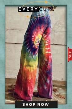 a woman's colorful tie - dyed pants with the words everycut on it