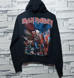 Welcome to our store.  Antique Iron Maiden Hoodie Size: S| Vintage Metal Music Hoodie | Run to the Hills | Aces High | Retro Unisex Metal Hoodie| Authentic Sweater  Please ensure the measurements are correct and do not be satisfied with the written sizes because they differ from country to country. Size: S Shoulder: 50 cm/ 19 inch Sleeve: 62 cm/ 24.4 inch Armpit to armpit: 50 cm/ 19 inch Length: 57 cm/ 22.4 inch Condition:          8/10   This item is used but in good condition. If there are any Fall Band Merch Hoodie With Logo Print, Winter Band Merch Hooded Sweatshirt, Winter Hooded Band Merch Sweatshirt, Winter Fan Merchandise Cotton Hoodie, Band Merch Hoodie For Winter, Band Merch Hoodie For Fall Fan Merchandise, Winter Band Merch Hoodie, Winter Band Logo Sweatshirt For Streetwear, Winter Band Merch Sweatshirt With Logo