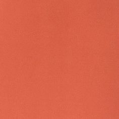 an orange background with some white dots on it