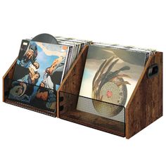 three cd's in a wooden holder with metal mesh sides and two cds on each side