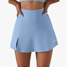 Brand New Tennis Skirt In Great Condition With Built In Shorts Size Xl Fits Like A Lg, Sizing Listed In The Pictures As Well Bundle And Save No Returns Casual Hip-length Skirt With Built-in Shorts, Sporty Flowy Mini Skirt Bottoms, Relaxed Swim Skirt With Pockets For Summer, Blue Swim Skirt With Built-in Shorts, Blue High Waist Swim Skirt For Spring, High Waist Blue Swim Skirt For Spring, Blue High-waist Swim Skirt For Spring, Casual Spring Skort, Hip-length, Casual Hip-length Skort For Spring