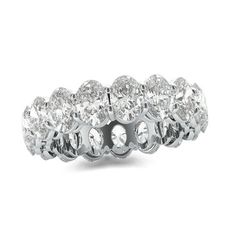 A stunning celebration of your commitment, this fancy-shape diamond eternity band is a confident choice for your bride or bride-to-be. Expertly crafted in sleek platinum, this sensational style showcases sparkling 1/4 ct. oval-cut diamonds - each boasting a color rank of I and clarity of VS2 - that surround the endless band. This breathtaking design is beguiling on its own or paired with her diamond solitaire. Dazzling with 5 cts. t.w. of diamonds and a brilliant buffed luster, this eternity ban Oval Diamond Cut White Gold Eternity Band, Luxury Oval Eternity Band With Diamond Accents, Classic Oval Diamond Eternity Band, Oval Diamond Eternity Band In Fine Jewelry Style, Oval Diamond Eternity Band Fine Jewelry, Silver Oval Eternity Band With Brilliant Cut, Oval Brilliant Cut Diamond Eternity Band, Classic Oval Moissanite Eternity Band, Oval Diamond Eternity Band With Brilliant Cut