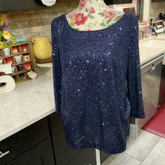 Alex Evenings Womens Navy Sequined 3/4 Sleeve Jewel Neck Blouse Top Size Medium New With Tags No Flaws Retails For $149 *See Photos For Approximate Measurements And Fabric Content 1003 Make A Statement With This Beautiful Alex Evenings Navy Blouse. The 3/4 Sleeves And Round Neckline Are Perfect For Any Occasion, Whether It's A Party Or A Day At The Office. The Blouse Is Adorned With Stunning Sequins, Adding A Touch Of Glamour To Your Outfit. The Hook And Eye Closure At The Back Ensures A Perfect Fitted Half Sleeve Tops For Party, Fitted 3/4 Sleeve Party Top, Elegant Blue Half Sleeve Top, Blue Fitted Half-sleeve Blouse, Elegant Blue Tops With 3/4 Sleeve, Elegant 3/4 Sleeve Blouse For Night Out, Spring Evening Blouse With 3/4 Sleeves, Elegant Blouse With 3/4 Sleeves For Night Out, Spring 3/4 Sleeve Top For Night Out