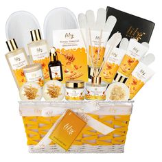 a yellow basket filled with lots of different types of skin care products and personal care items