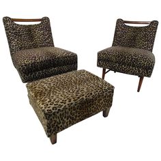 two leopard print chairs and a foot stool