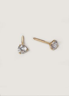 Timeless and versatile, June is the perfect accessory for any occasion. Wear these diamond stud earrings with casual or formal wear to add a touch of sophistication to any outfit. They're true modern heirlooms that will never go out of style, and will be a cherished addition to any jewelry collection. 14k solid gold—always Total weight: 0.6g (0.50ctw), 1.16g (1ctw), 1.45g (1.5ctw) Lab created diamonds set in a three prong martini setting Diamond 4 C's: 0.50ctw, 1ctw, 1.5ctw, Round Brilliant, VS, Classic Diamond Drop Earrings For Everyday Luxury, Classic Yellow Gold Bridal Earrings With Brilliant Cut, Minimalist Brilliant Cut Earrings For Formal Occasions, Minimalist Formal Earrings With Brilliant Cut, Classic Diamond Earrings With Matching Pair, Classic Yellow Gold Bridal Earrings With Cubic Zirconia, Classic Round Cut Earrings For Everyday Luxury, Classic Drop Earrings For Everyday, Minimalist Brilliant Cut Diamond Earrings For Formal Occasions