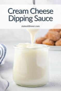 the best cream cheese dip is in a glass jar and next to some donuts