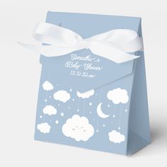 a blue baby shower bag with clouds and stars