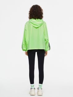 Details: Long sleeve hooded windbreaker in neon green Zip front closure Side pockets Pull loop elastic hood and hem Handwritten 'Note' Graphic on chest Logo stripe on sleeve Loose fit Materials & Care: 100% Polyester Hand wash | Dry clean Do not bleach Size & Fit: Model is 5'7", Bust 32, Waist 24, Hips 35, wearing a size S Item #: JL3JA06 Green Athleisure Outerwear With Ribbed Cuffs, Trendy Stretch Hooded Outerwear, Spring Athleisure Nylon Hooded Jacket, Green Athleisure Hooded Jacket For Sports, Spring Athleisure Track Jacket With Drawstring Hood, Spring Track Jacket With Drawstring Hood For Outdoor Activities, Trendy Hooded Jacket For Spring Outdoor Activities, Spring Stretch Outerwear For Outdoor Activities, Spring Athleisure Windbreaker With Drawstring Hood