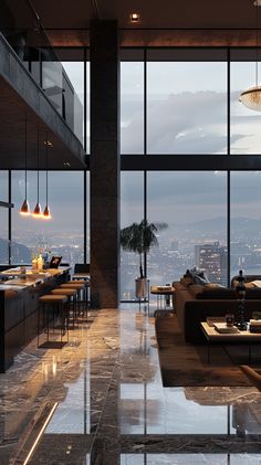 a living room filled with lots of furniture and large windows overlooking the cityscape