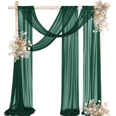 a green curtain with flowers on the side and white flowers hanging from it's sides