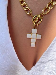 A handmade gold necklace with a unique Cross charm at the center that has a white type of stones on it that are made from enamel. The connection is at the front side with a circle part so it can not be adjusted. In Christina Christi Jewels store you can see more than 50 designs in Women's Necklaces. You can have them in 2-4 Days with DHL EXPRESS SHIPPING MATERIALS - Gold filled Chains are made from Aluminium. - White Cross charm made from brass with White type of stones on it (enamel). DIMENSION White Chain Necklace With Charms For Gifts, White Plated Necklaces As Gift, White Plated Pendant Necklaces, White Plated Pendant Necklace, Handmade Yellow Gold Enamel Necklaces, Handmade Yellow Gold Enamel Necklace, White Cross Chain Jewelry, White Cross-shaped Chain Jewelry, Handmade Gold Enamel Necklaces