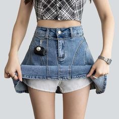 Introducing our 2023 Summer Collection's Flare Above-the-knee Denim Skirt that fuses the Y2K style with trendy fashion! Filled with nostalgia and youthful energy. this high-waisted shorts-skirt will make you the talk of the town!Why You'll Fall In LoveThis skort is a creative ode to the much-loved Y2K fashion era. patterned to make sure you stand out and turn heads. From its unique pieced-together design to its attention-grabbing high-waist silhouette. every detail is crafted to perfection.Unmis Y2k Short Denim Skirt With Pockets, Trendy Denim Skort With Built-in Shorts, High Rise Y2k Skort, Spring High-waisted Denim Skirt With Built-in Shorts, Spring Denim Skort With Built-in Shorts, Denim Skort With Built-in Shorts For Spring, Trendy High-waist Skort For Streetwear, Trendy High Waist Skort For Streetwear, Trendy Mini Denim Skirt With Pockets