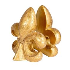 Add a touch of sophistication to the book collection with these exquisite Fleur de Lis bookends. Cast in high-quality resin and finished in a radiant gold, they bring a blend of elegance and functionality to any room. The iconic Fleur de Lis design is a nod to classic style, while the bookends' dimensions of 8.5 inches in length, 8 inches in width, and 9 inches in height make them a versatile fit for bookshelves of any size. Whether placed in a home office, living room, or study, these bookends Home Office Living Room, Timeless Decor, Creative Co Op, Office Living Room, Book Collection, Book Lovers Gifts, Bookends, Bookshelves, Thoughtful Gifts