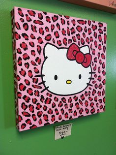 a hello kitty painting on a green wall with a pink background and red leopard print