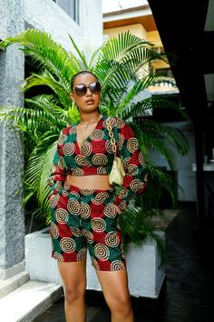 100% African print cotton. Co-ord set sold together. Wrap top is lined. Short is unlined and has pocket. Shorts has elastic at the back and zipper. Model is 5'7 and wore a M. Ankara Shorts And Top For Ladies, Ankara Shorts For Women, Ankara Short And Top For Ladies, African Print Shorts For Women, African Print Shorts, Ankara Crop Top, Cruise Collection, Native Style, Crop Top And Shorts