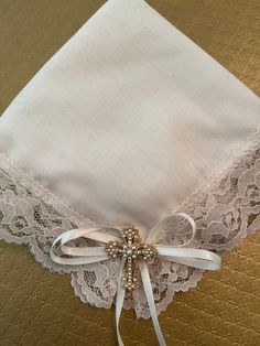 A very special ivory hanky with a gold cross and delicate lace edging. It is a precious keepsake for the bride to wipe away her happy tears! Hanky is boxed for gift-giving.  Please visit our store for other Precious Keepsakes. We specialize in Weddings.  Thank you everyone!! Wishing you the best wedding day ever! Best always, Elegance by Gianna Gift For The Bride, Precious Gift, Happy Tears, Wish You The Best, Gold Cross, Lace Edging, Bride Gifts, Wedding Favors, The Bride