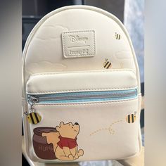 Brand New/ Never Used. Has Been In Storage The Whole Time. No Visible Damage Other Then Slight Crease Marks Brown Interior Disney Loungefly Backpack Winnie The Pooh, Winnie The Pooh Purse, Hello Kitty Gumball Machine, Loungefly Disney Backpack, Lounge Fly, Loungefly Purse, Disney Bags Backpacks, Disney Backpack, Winnie The Pooh Piglet