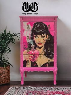 a pink dresser with an image of a woman holding a heart